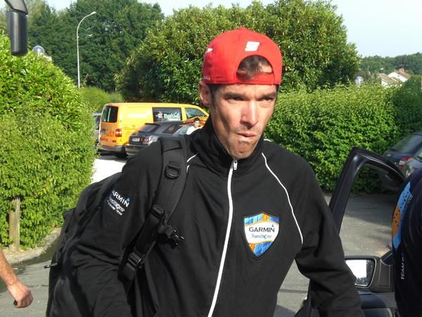 David Millar makes his way off the Garmin bus. Next stop sick bay