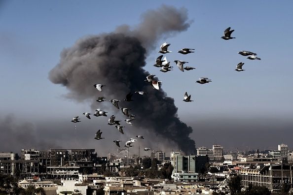 Smoke billows in Mosul.