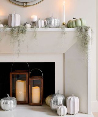 Faux pumpkin decor around fireplace
