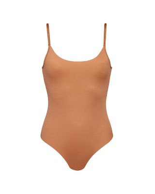 tan colored bodysuit