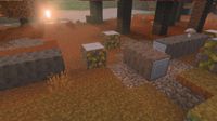 Close-up of Poplar wood logs and blocks placed on the forest floor within Minecraft's new Dappled Forest biome.