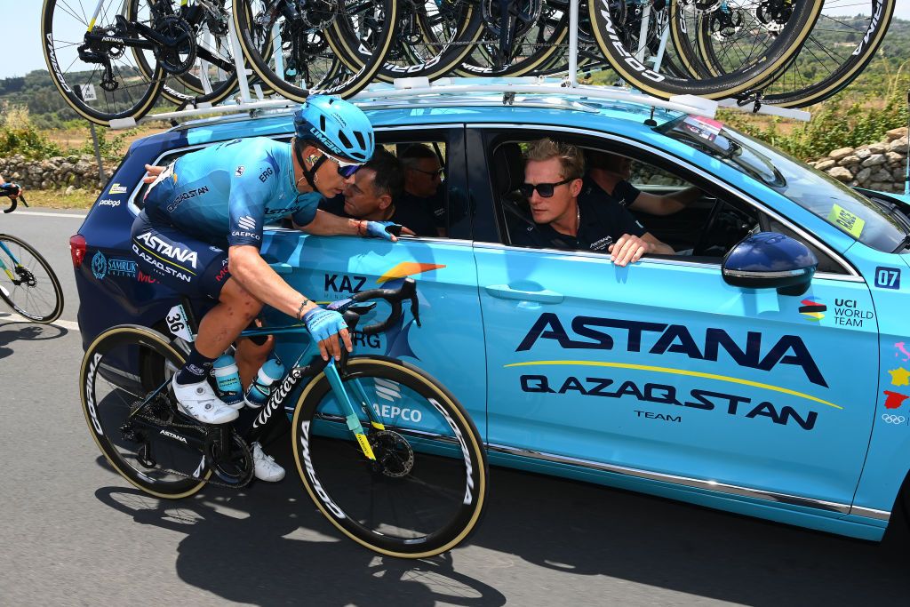ETNA PIAZZALE RIFUGIO SAPIENZA ITALY MAY 10 LR Miguel ngel Lpez Moreno of Colombia and Team Astana Qazaqstan talks with Aleksandr Vinokrov of Kazakhstan team Team manager prior to abandon the race during the 105th Giro dItalia 2022 Stage 4 a 172km stage from Avola to Etna Piazzale Rifugio Sapienza 1899m Giro WorldTour on May 10 2022 in Etna Piazzale Rifugio Sapienza Italy Photo by Tim de WaeleGetty Images