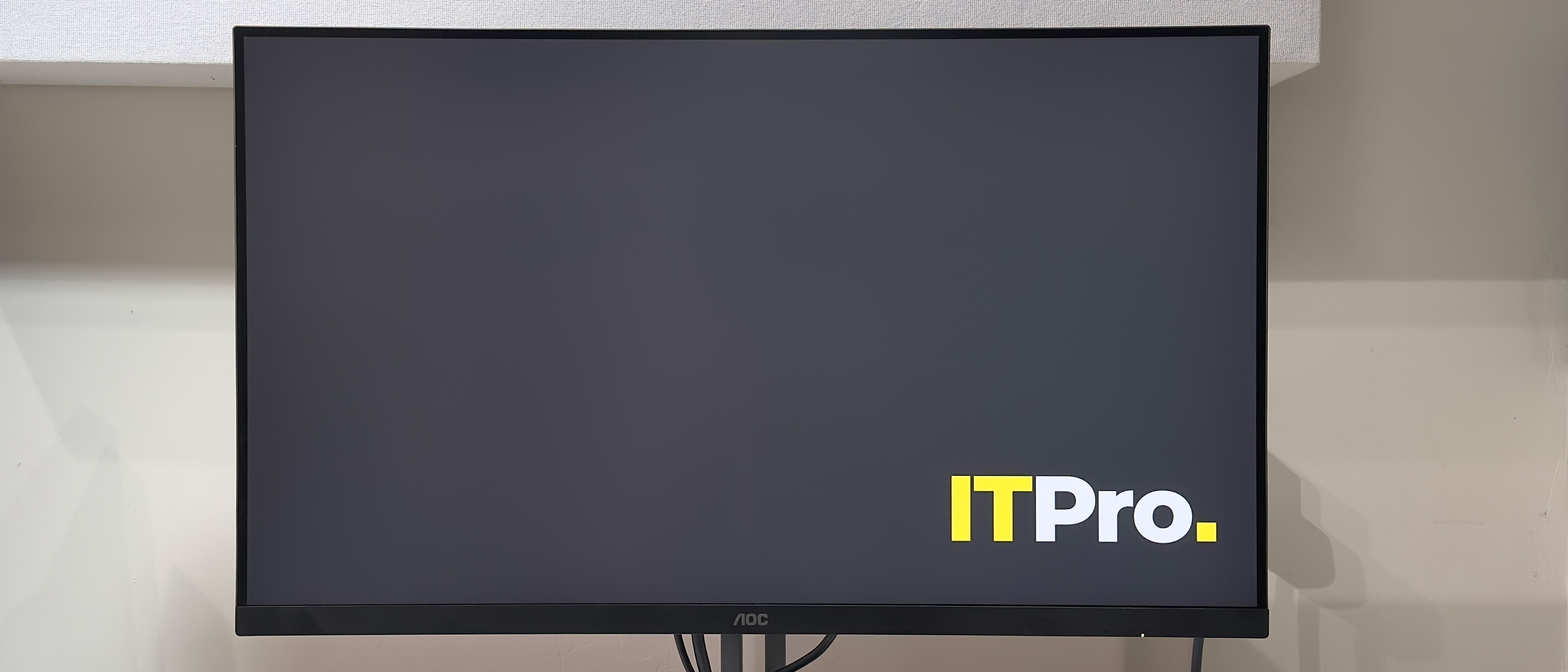 The AOC Graphic Pro U32U3CV on a desk