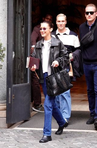 Bella Hadid wears a Saint Laurent bomber jacket