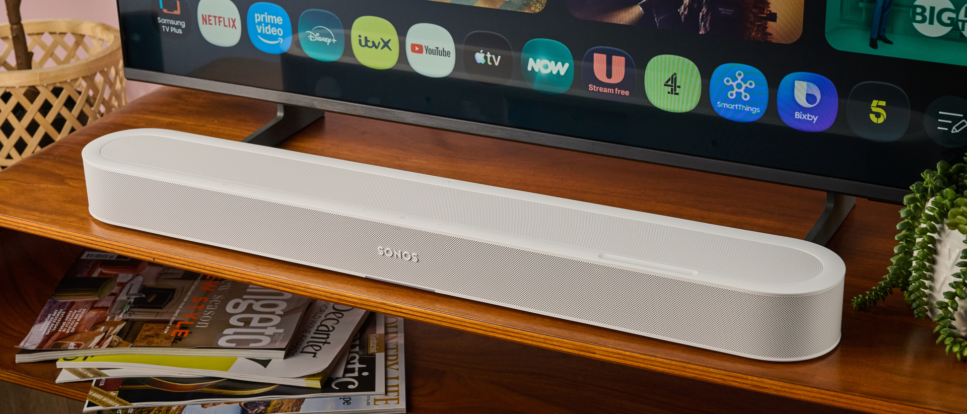 Sonos Beam Ultra below TV on table