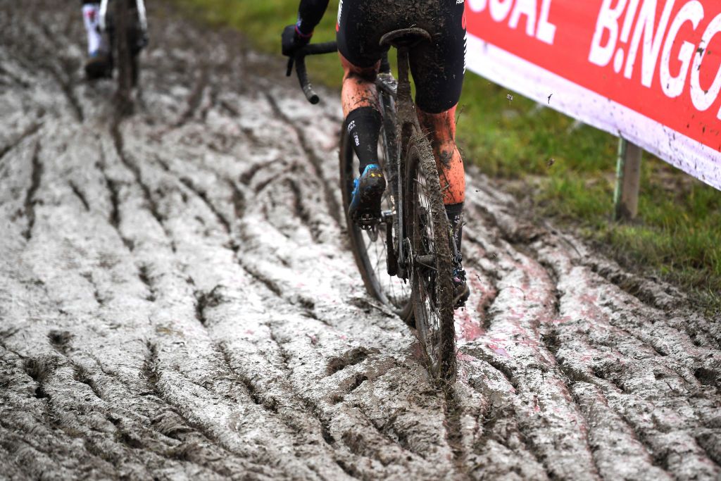 DENDERMONDE BELGIUM DECEMBER 26 Detail view of a rider competing on a muddy sector during the 2nd Dendermonde UCI CycloCross Worldcup 2021 Womens Elite CXWorldCup UCIcyclocrossWC on December 26 2021 in Dendermonde Belgium Photo by Luc ClaessenGetty Images