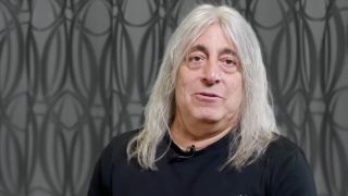 Mikkey Dee of Mot&ouml;rhead against a grey background in 2026