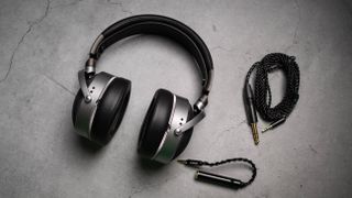 Audeze LCD-S20 planar headset against a grey craft sheet highlighting the product design