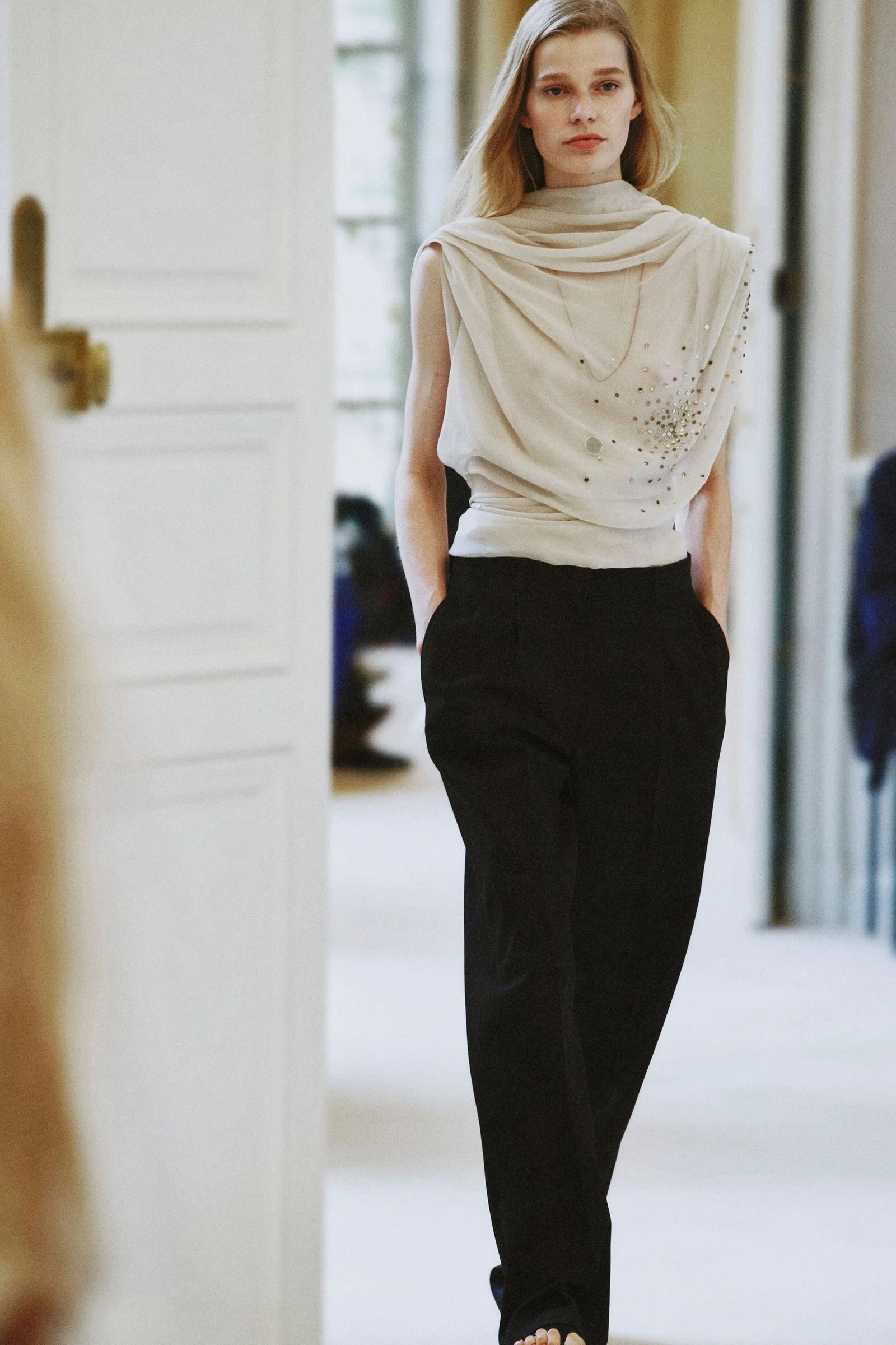a model walks the The Row summer 2027 runway during Paris Fashion Week