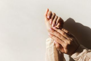 A close up of a person's hands.