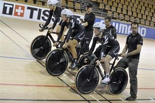 The New Zealand pursuit team gets ready for a practice run.