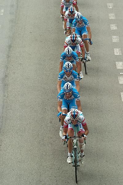 Riders in single file along the highway out of Ayer Tawar heading for the climb into the Cameron Highlands.