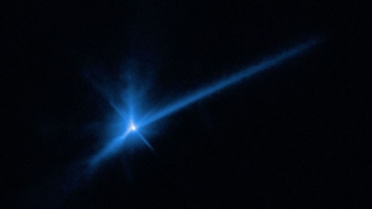 A photo of the dust plume and tail of asteroid Dimorphos after the DART collision