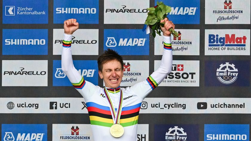 Winner Slovenia&#039;s Tadej Pogacar celebrates during the podium ceremony of the men&#039;s Elite Road Race cycling event as part of the UCI 2024 Road World Championships, in Zurich, on September 29, 2024. 