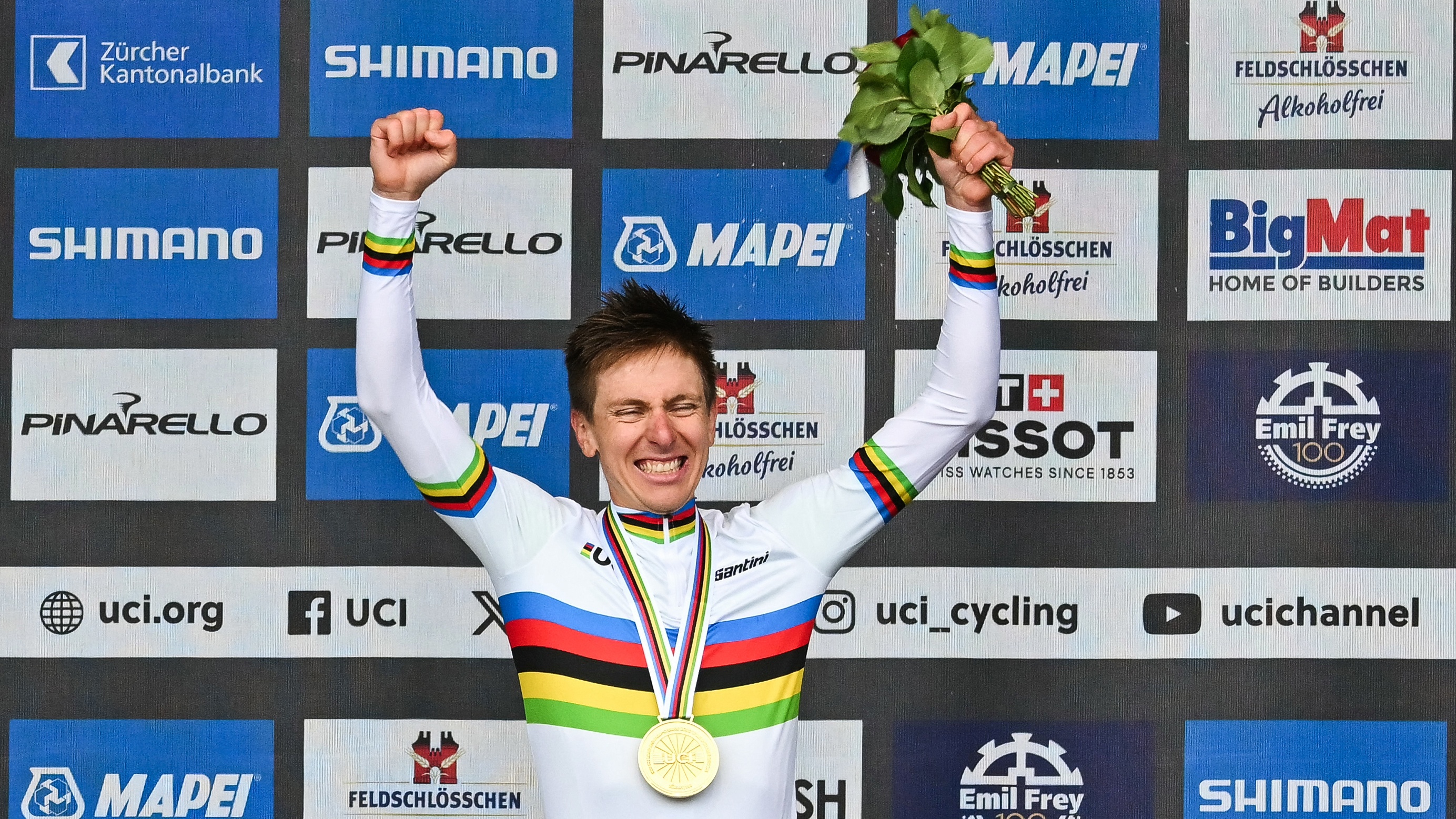 Winner Slovenia's Tadej Pogacar celebrates during the podium ceremony of the men's Elite Road Race cycling event as part of the UCI 2024 Road World Championships, in Zurich, on September 29, 2024.