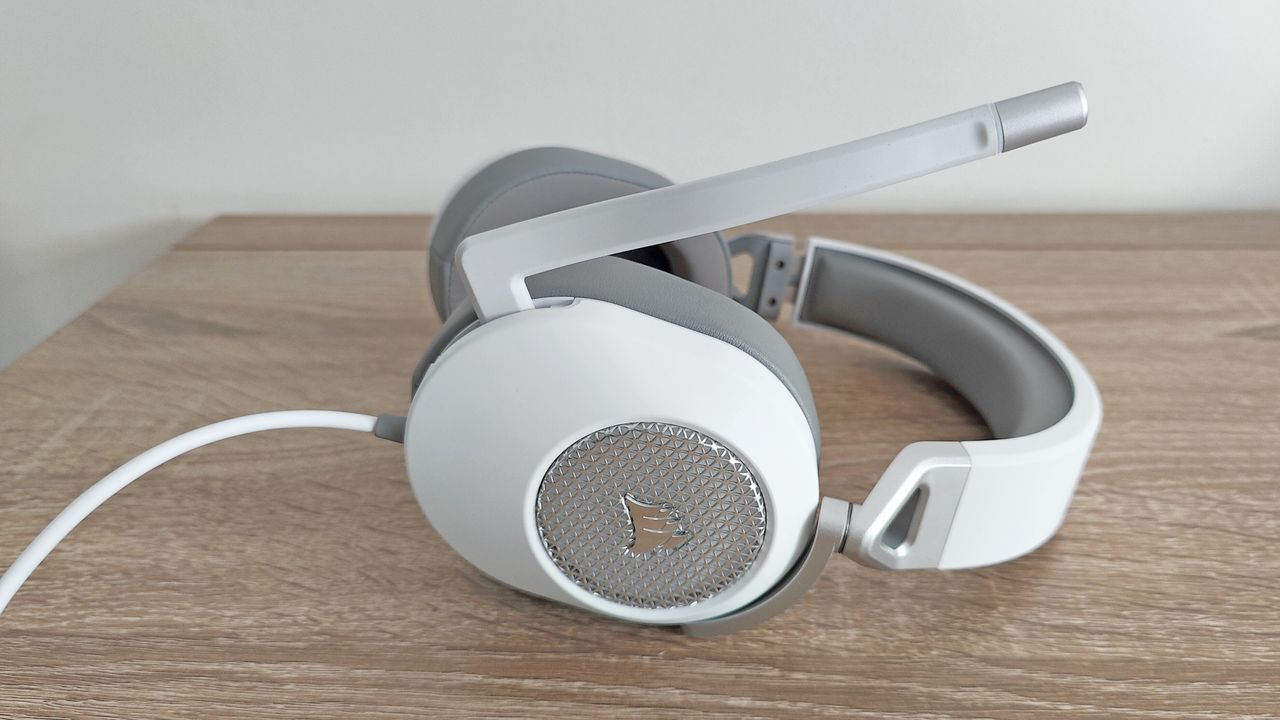 Corsair HS65 Surround review: white gaming headset on a wooden table