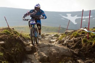 Gee Atherton (Commencal) negotates a technical track at Fort William on his way to a World Cup round win.