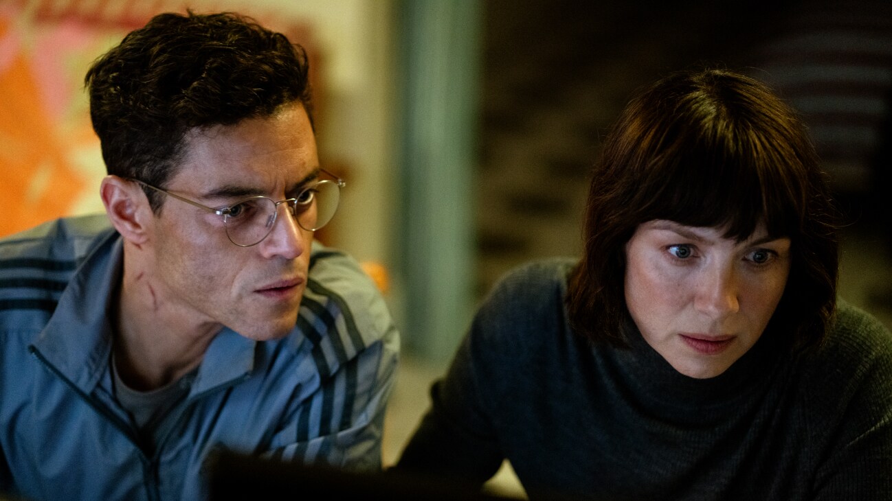 Rami Malek and Caitriona Balfe in The Amateur