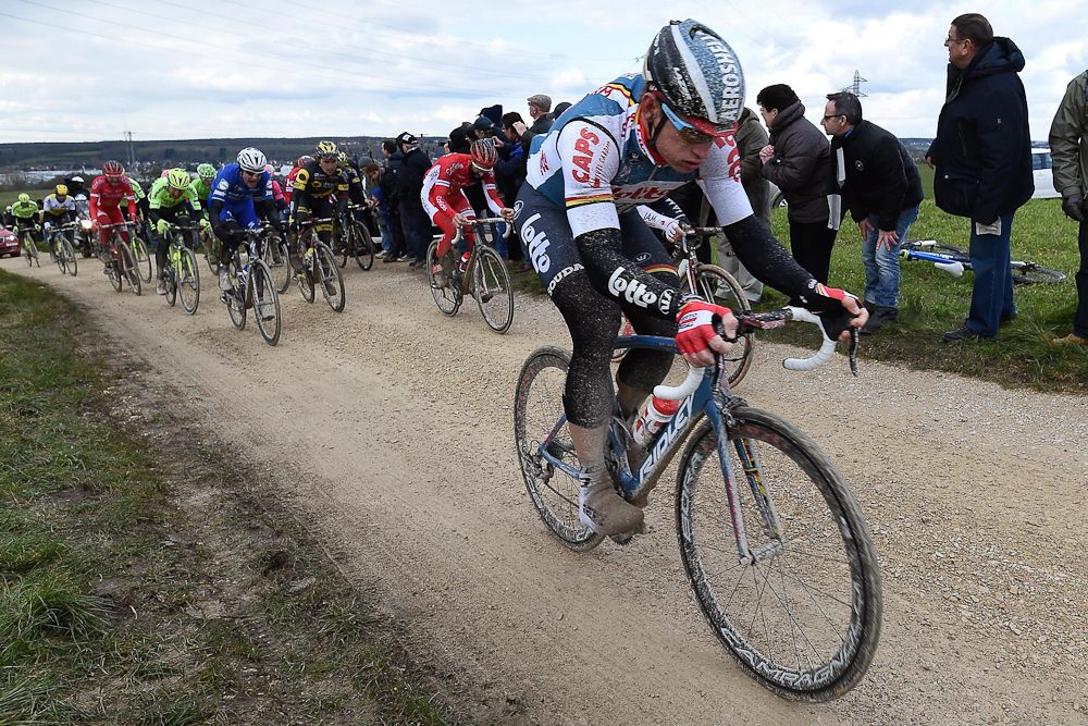 A Lotto rider on a gravel section during stage 1 at Paris-Nice.