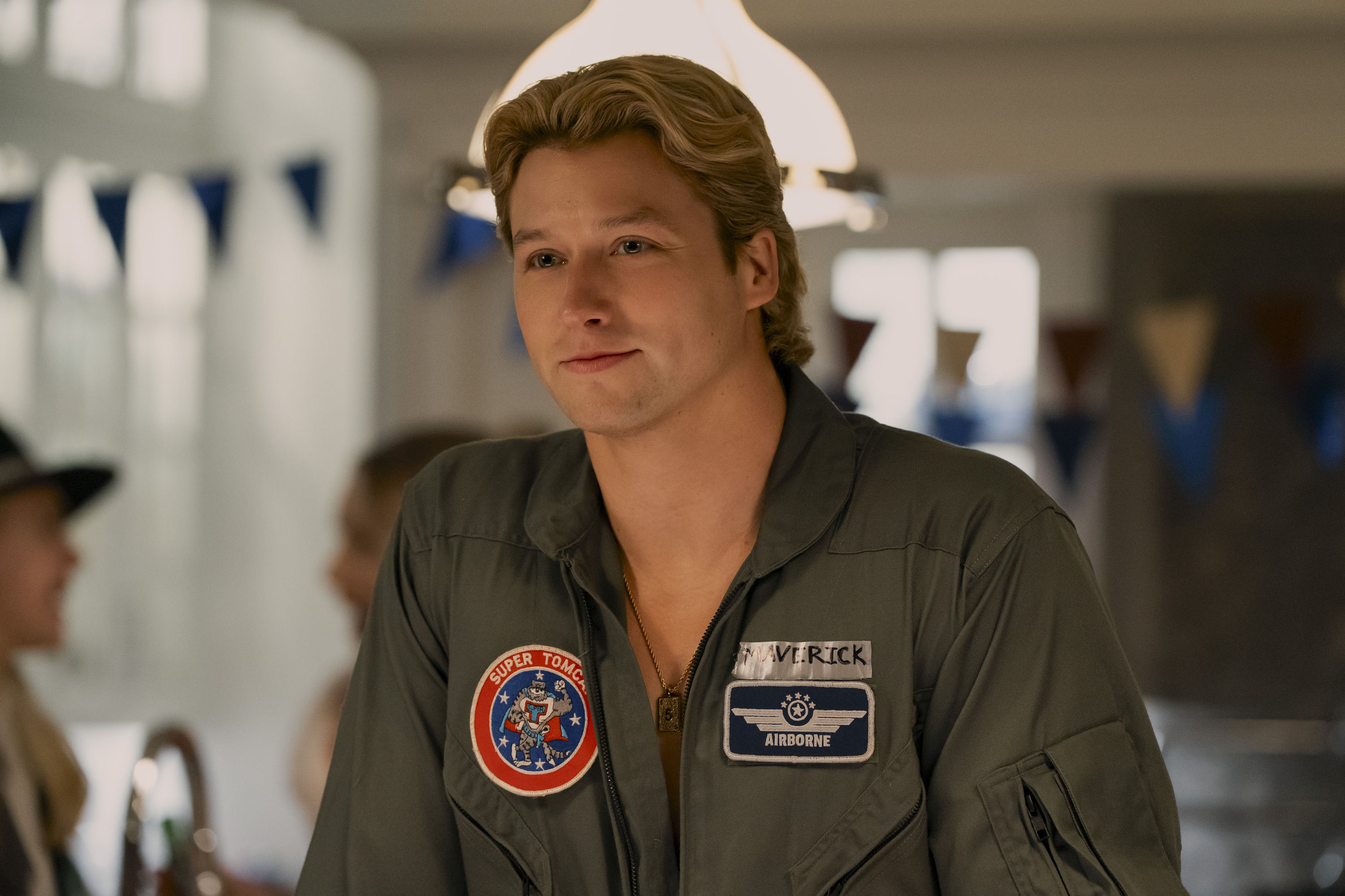 Dean Di Laurentis (Stephen Thomas Kalyn) wears a Top Gun costume at a costume party in OFF CAMPUS