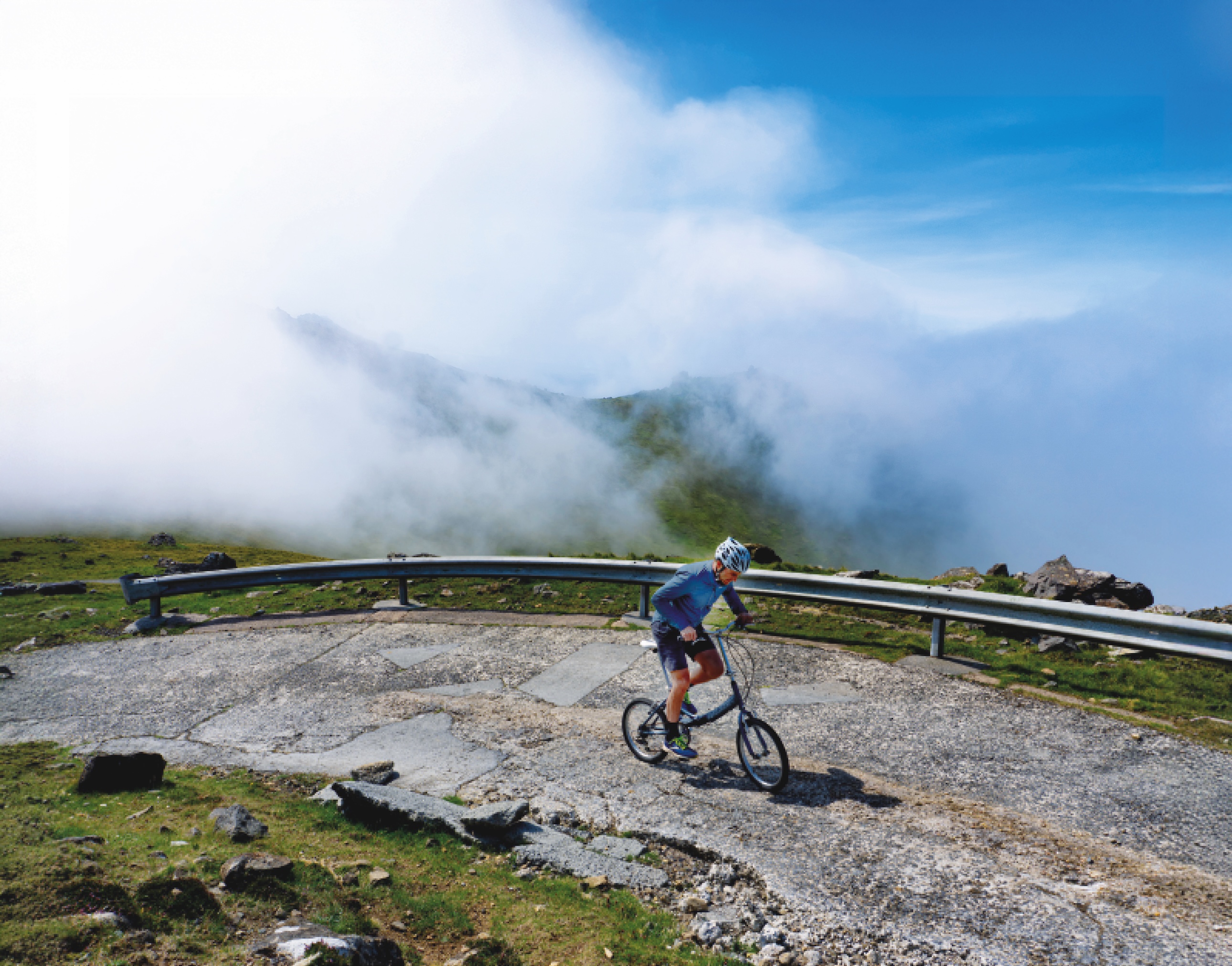 Matt Sparkes riding up St Kilda climb on his folding bike 