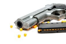 A BB gun with pellets.