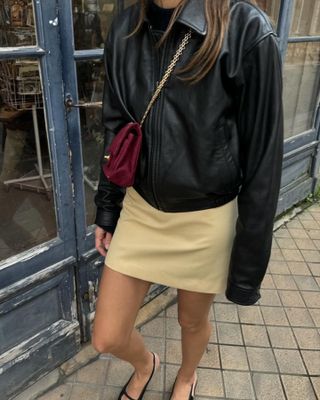 leather jacket and miniskirt outfit