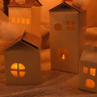 DIY Christmas light-up houses made with milk cartons
