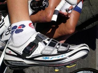 The king wears his customised cycling shoes