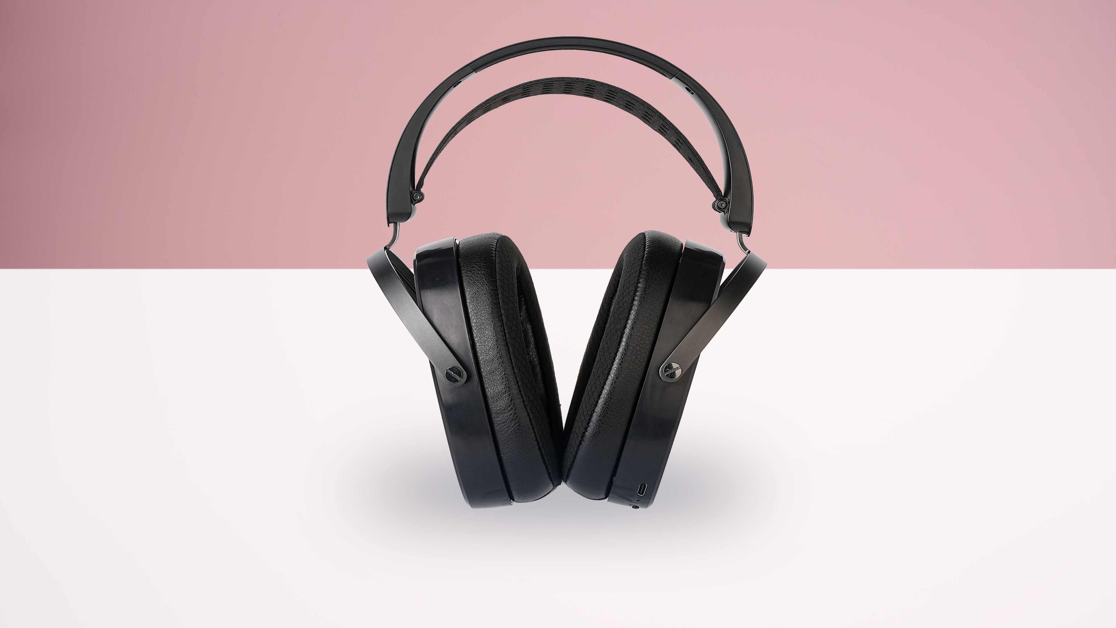 The HiFiMan Arya Wi-Fi on a white table.