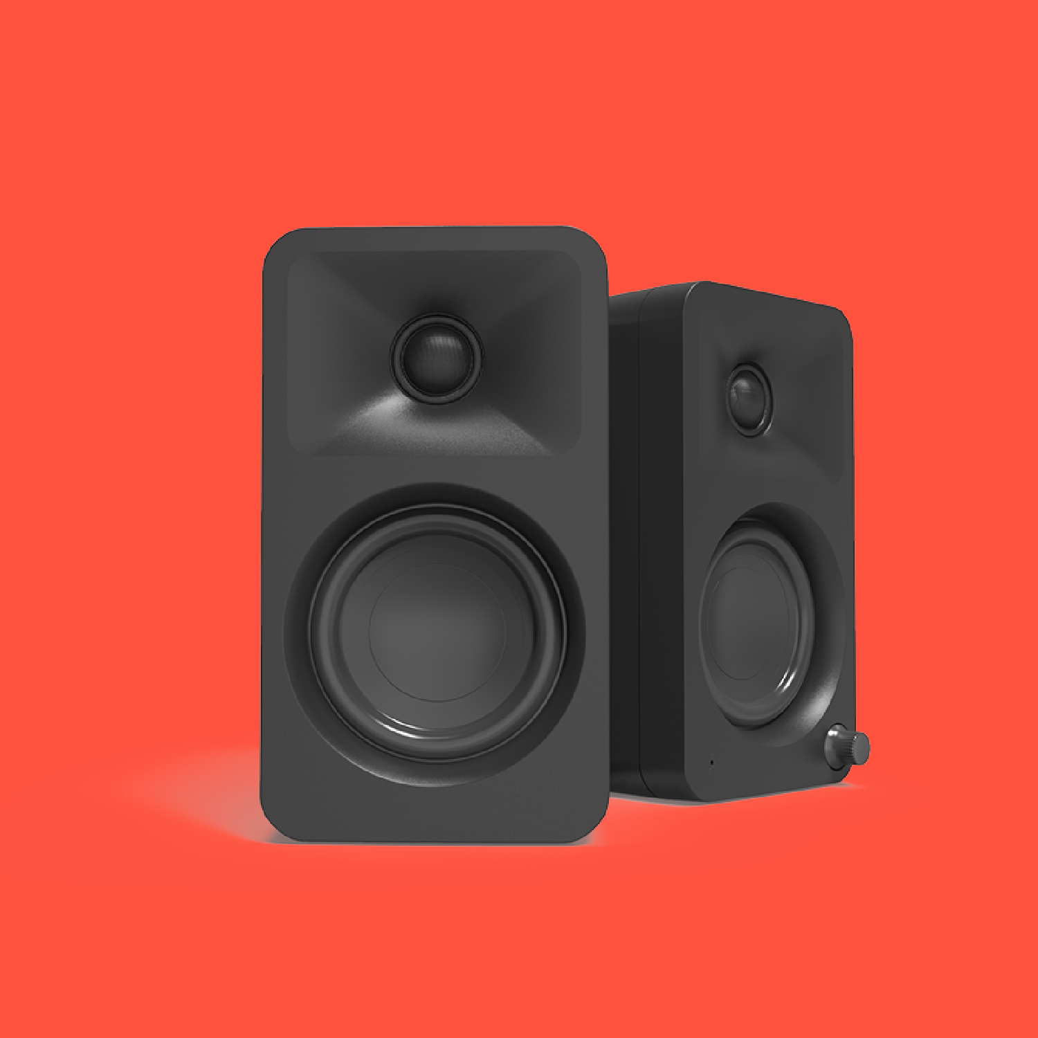 The Kanto Ora reference speakers on a red background