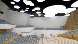 The complex’s Concert Hall is clad in customized white ceramic tiles and solid bamboo.