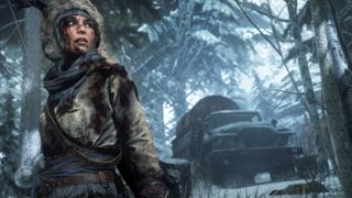 Lara Croft with bloodied face in winter gear in Rise of the Tomb Raider