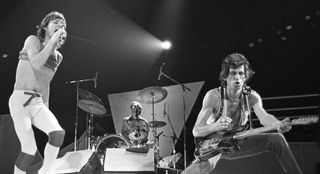 (from left) Mick Jagger, Charlie Watts and Keith Richards of The Rolling Stones perform at the Rosemont Horizon in Chicago, Illinois on November 24, 1981