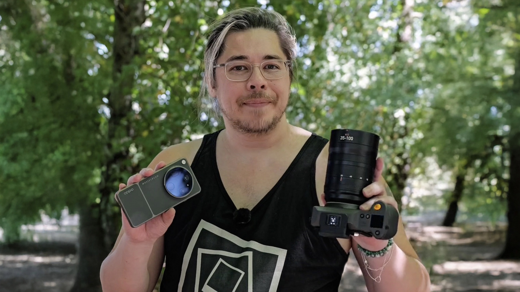 James Artaius holding an Oppo Find X9 Ultra and a Hasselblad X2D II 100C outdoors