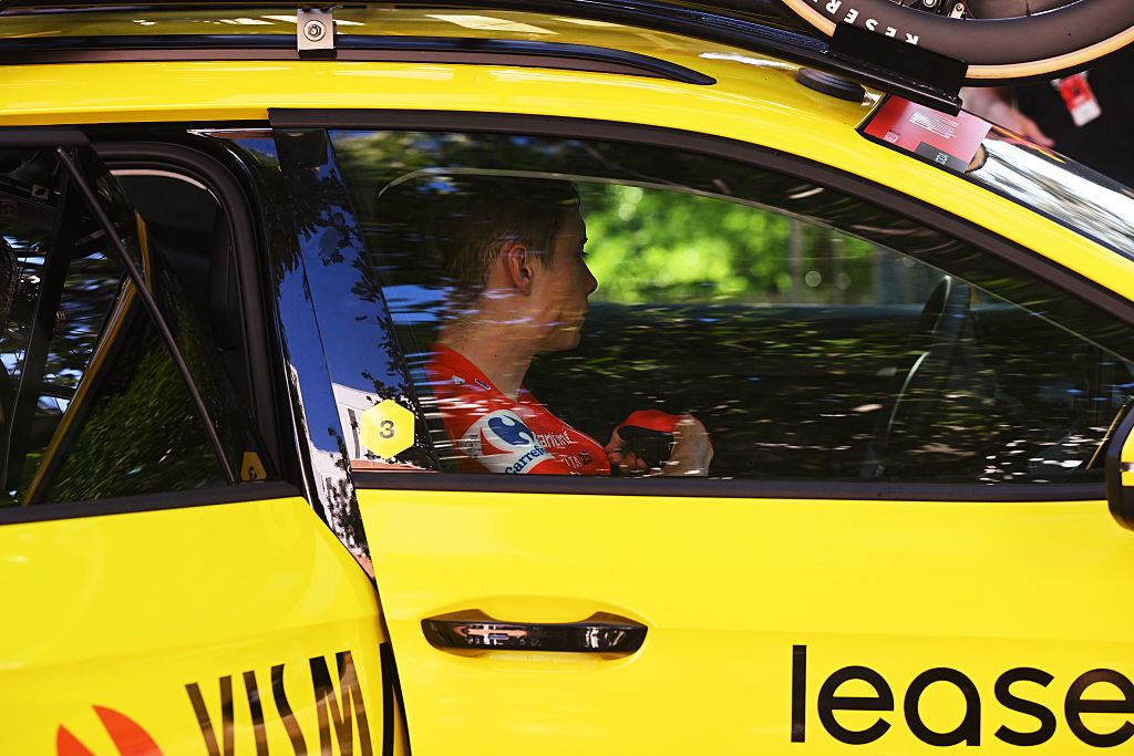 MADRID, SPAIN - SEPTEMBER 14: Jonas Vingegaard of Denmark and Team Visma | Lease a Bike - Red Leader Jersey and the peloton is at a standstill due to the pro-Palestinian protests in the city of Madrid during the La Vuelta - 80th Tour of Spain 2025, Stage 21 a 108km stage from Alalpardo to Madrid / The race is neutralised due to disturbances in central Madrid caused by pro-Palestinian protests / #UCIWT / on September 14, 2025 in Madrid, Spain. (Photo by Dario Belingheri/Getty Images)