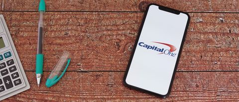 Capital One app on phone sitting on table