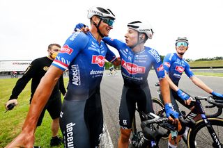 NOGARO FRANCE JULY 04 LR Mathieu Van Der Poel of The Netherlands and stage winner Jasper Philipsen of Belgium and Team AlpecinDeceuninck react after the stage four of the 110th Tour de France 2023 a 1818km stage from Dax to Nogaro UCIWT on July 04 2023 in Nogaro France Photo by David RamosGetty Images