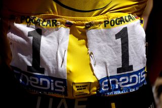 NMES FRANCE JULY 08 Tadej Pogaar of Slovenia and UAETeam Emirates Yellow Leader Jersey at start during the 108th Tour de France 2021 Stage 12 a 1594km stage from SaintPaulTroisChateaux to Nimes BIB Number Detail view LeTour TDF2021 on July 08 2021 in Nmes France Photo by Chris GraythenGetty Images