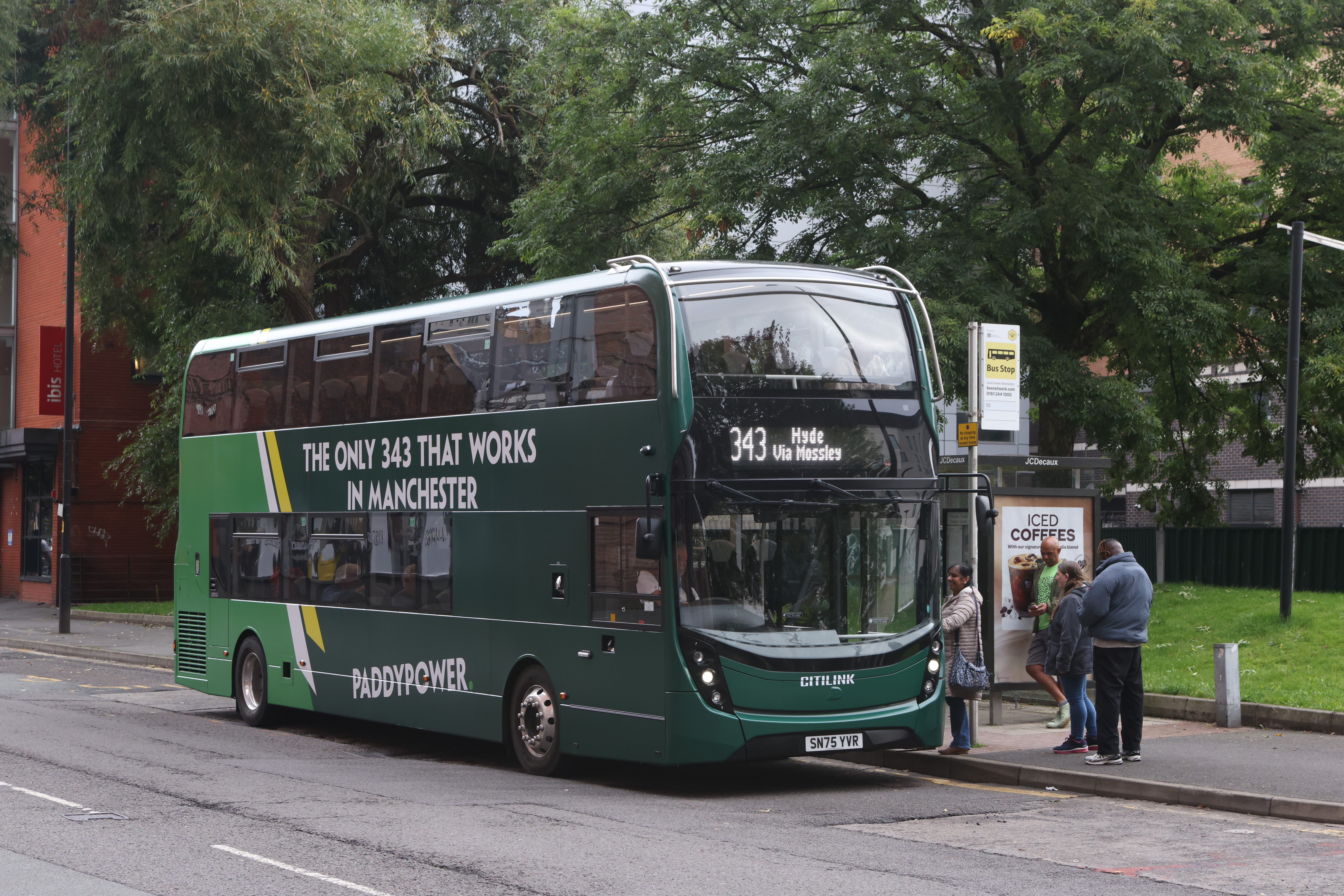 Bus poking fun at Ruben Amorim&#039;s 3-4-3 formation drives through Manchester