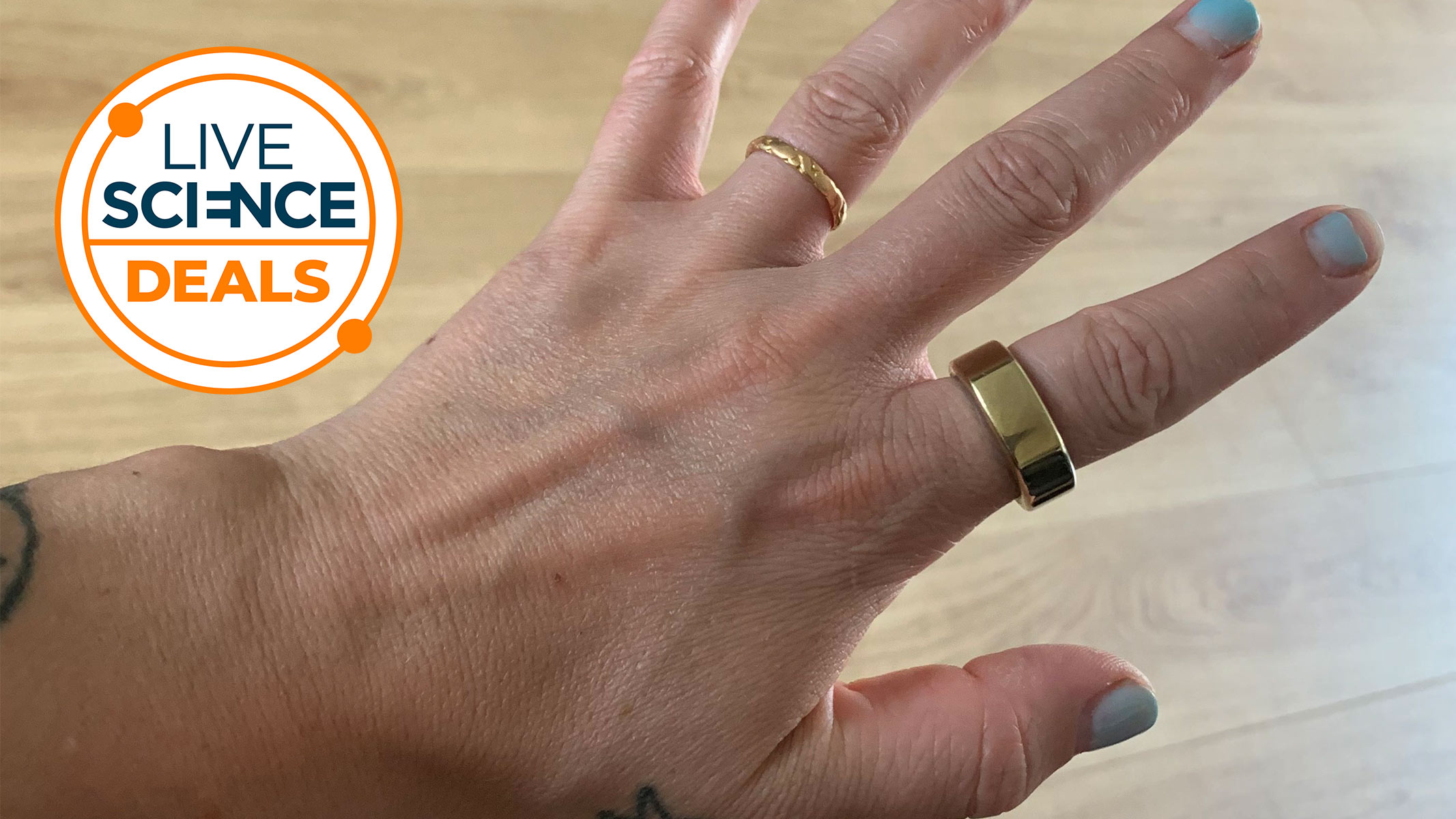 A Live Science deal logo and a picture of our reviewer's hand wearing the Oura Ring Gen 3