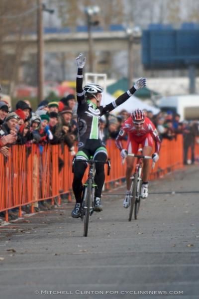 Powers checks his margin at the finish.