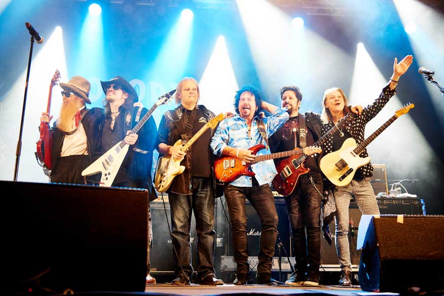 Supersonic Blues Machine taking a bow onstage