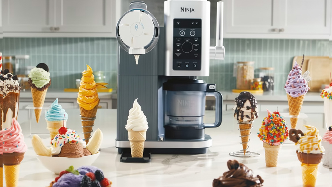 Swirl by CREAMi; this image is a product advertisement showcasing a tall, upright, silver and black Ninja ice cream machine in the center of a clean, white kitchen counter.