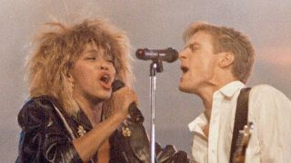 Bryan Adams and Tina Turner onstage