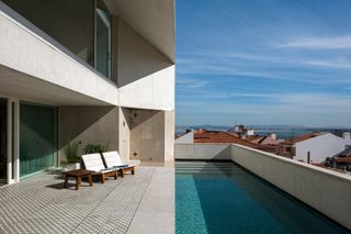 Swimming pool with views of the cityscape