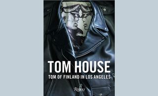 Tom House poster, black leather biker jacket , inside a black and white image of two males facing each other wearing leather caps, 'Tom House' 'Tom of Finland in Los Angeles' wrote in white lettering at the bottom of the image