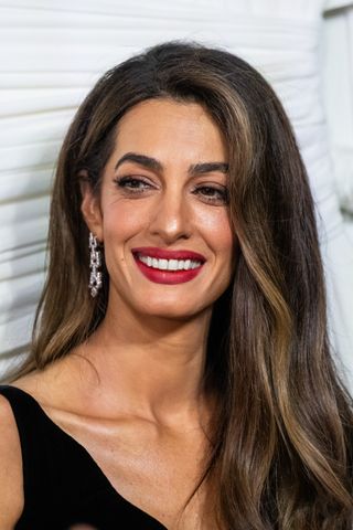 Amal Clooney wearing full Charlotte Tilbury glam to the Albies