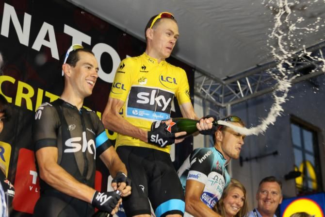 Chris Froome (centre) celebrates another win