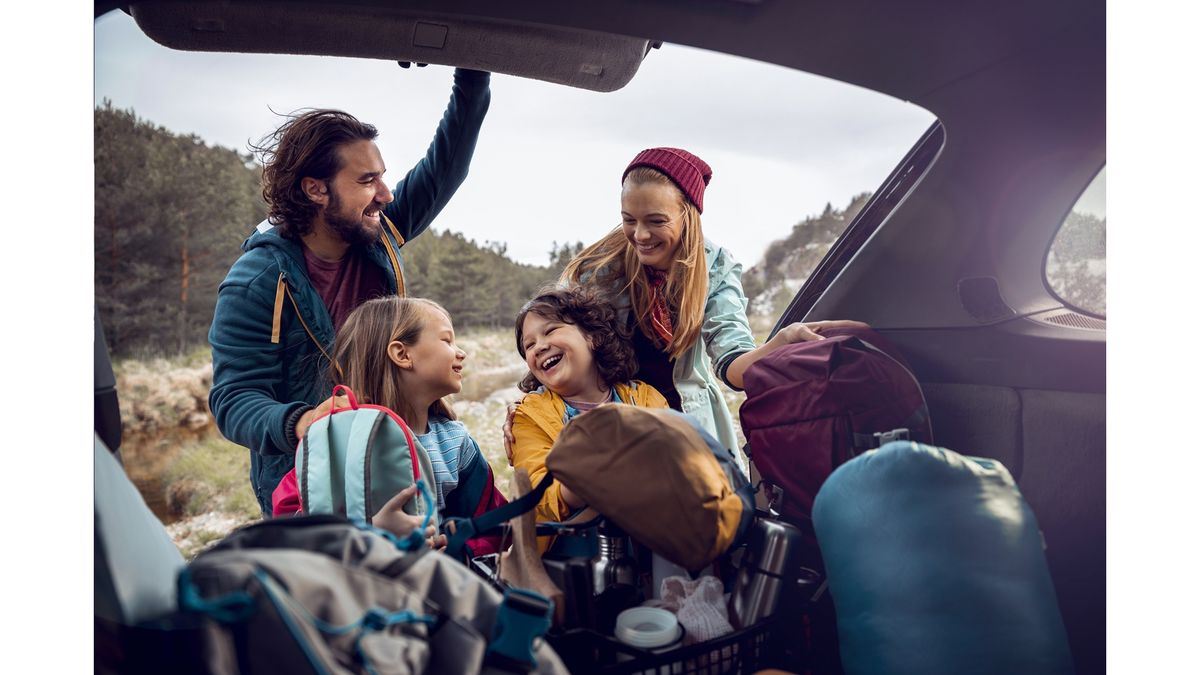 A family setting up for camping